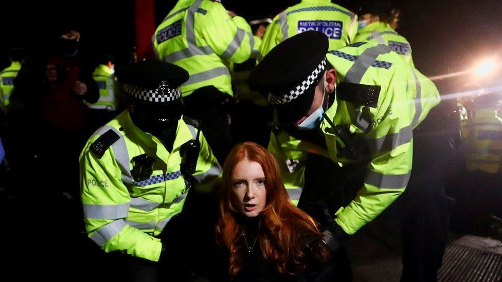 Police arrest woman protesting